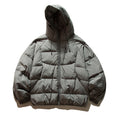 Unisex Oversize quilted jacket in boxy cut with hood and adjustable hem Fashion Glam