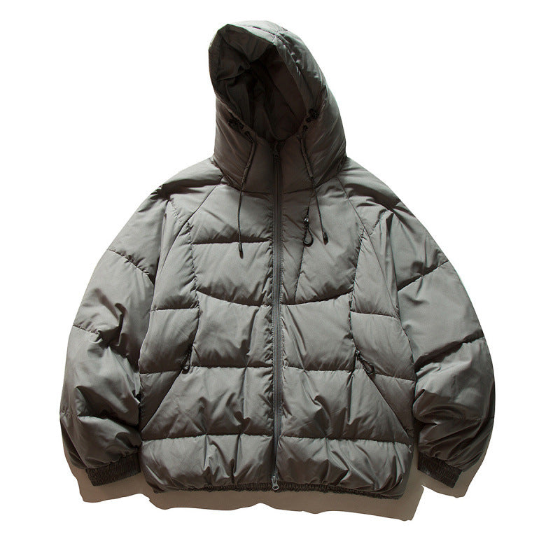 Unisex Oversize quilted jacket in boxy cut with hood and adjustable hem Fashion Glam