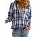 Women’s check blouse in oversized look with V-neck, button placket, and rounded hem Fashion Glam