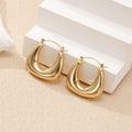 Ladies earrings in a modern, curved design Fashion Glam