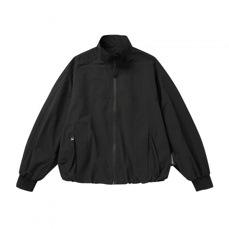 Unisex Lightweight Boxy Outdoor Jacket in Track Style with High Stand-Up Collar, Zipper Pockets and Elastic Hem Fashion Glam