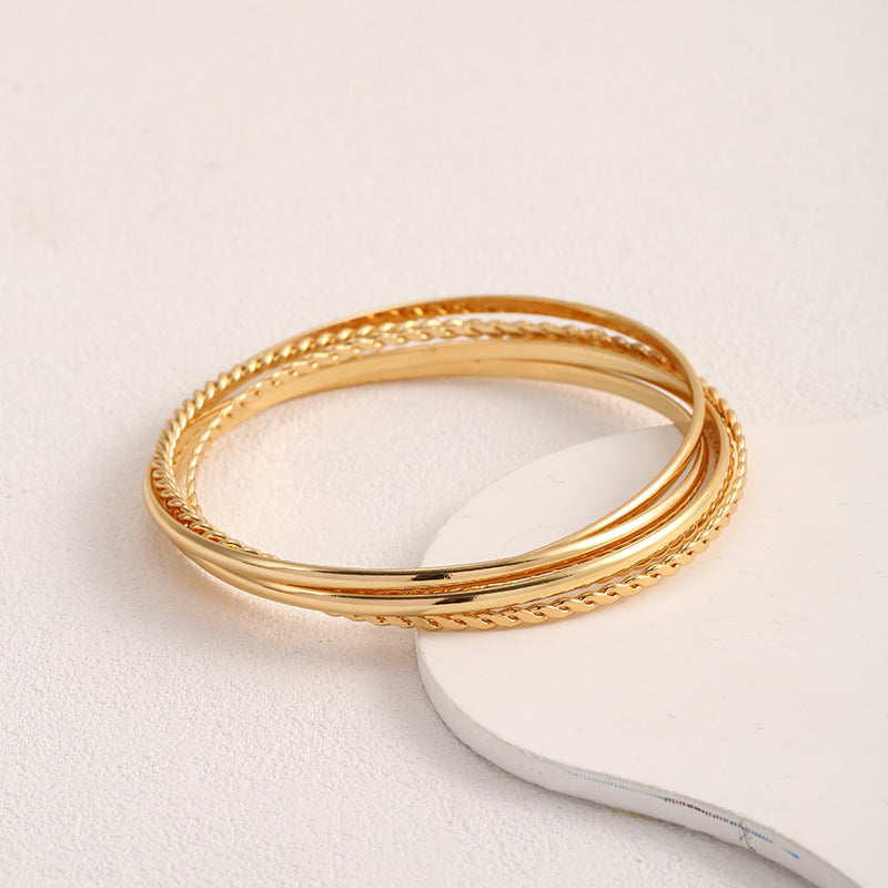 Women's bangle set with elaborate, braided and simple designs Fashion Glam