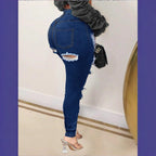 Ladies high-waisted skinny jeans with XXL knee cutouts, heavily distressed used look and sculpting cut Fashion Glam