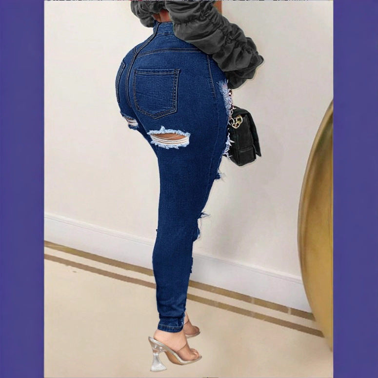 Ladies high-waisted skinny jeans with XXL knee cutouts, heavily distressed used look and sculpting cut Fashion Glam