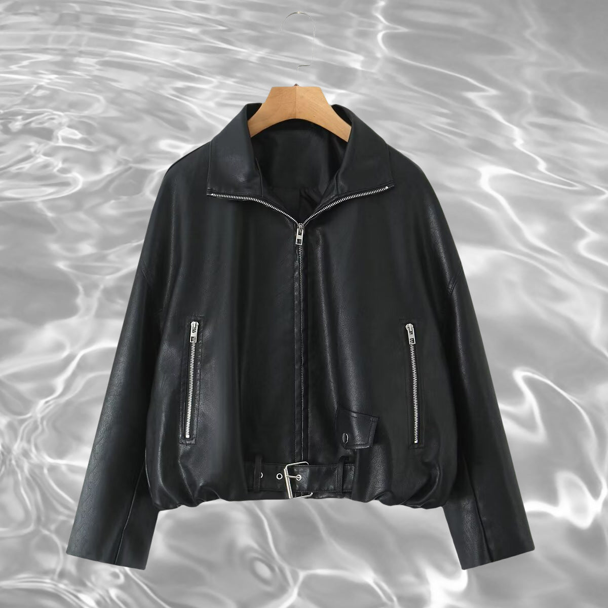 Women’s cropped oversized leather jacket in bomber style with zippered pockets and waist belt Fashion Glam