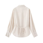 Women Two-piece ensemble consisting of fitted blouse with tie and high-waisted palazzo pants Fashion Glam