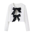 Women's short bolero jacket with sequin trim and double tied satin bows Fashion Glam