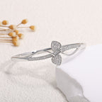 Women's bangle with elegant infinity pattern and sparkling zirconia Fashion Glam