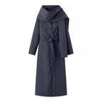 Women’s long coat with oversized shawl collar, belt at the waist and pinstripes Fashion Glam