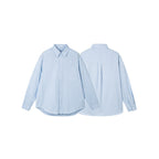 Women's oversized shirt with fine stripes, breast pocket, and rounded hem Fashion Glam