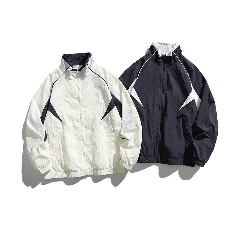 Unisex Lightweight Boxy Hooded Jacket in Windbreaker Style with Contrast Panels and Raglan Sleeves Fashion Glam