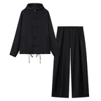 Women's lightweight boxy jacket with stand-up collar, zipper front, drawstring and decorative knot closures Fashion Glam