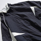 Unisex Lightweight Boxy Hooded Jacket in Windbreaker Style with Contrast Panels and Raglan Sleeves Fashion Glam