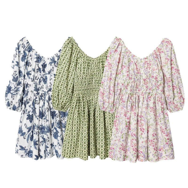 Women's floral dress with smocked waist and voluminous puff sleeves Fashion Glam