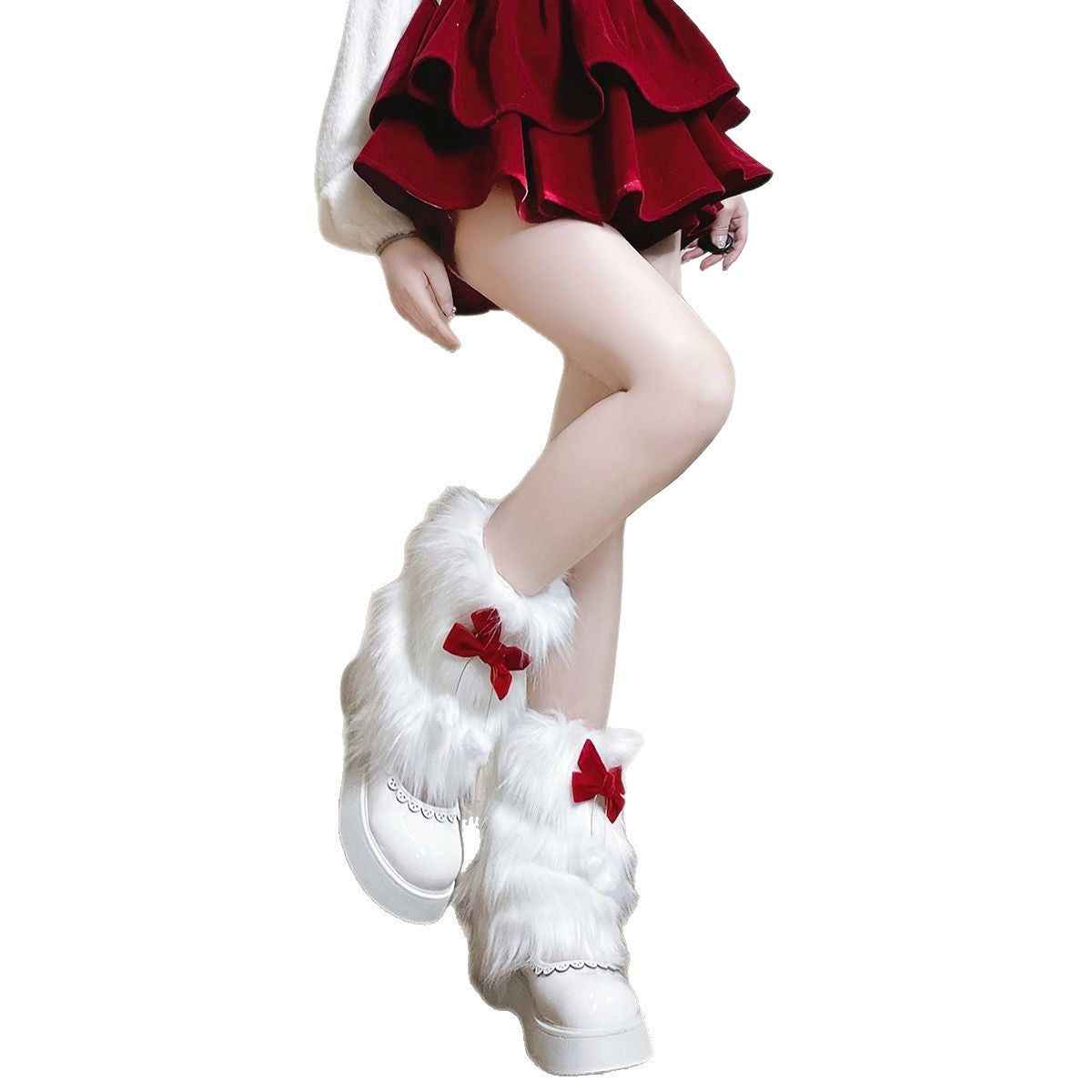 Ladies cozy boot cuffs made of faux fur with bow appliqué and pompons Fashion Glam
