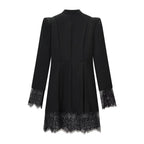 Women's midi dress with stand-up collar, cut-out front, gold decorative fasteners, and lace trim Fashion Glam