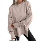 Women's Oversize Sweatshirt with Center Seam, Extended Hem, and Ribbed Cuffs Fashion Glam