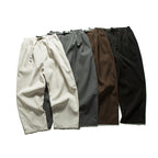 Men's Wide Cut Relaxed Pants with Elastic Waistband, Pleats and Integrated Woven Belt Fashion Glam