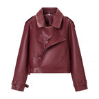 Ladies short cut biker jacket made of faux leather with asymmetrical front and waist belt Fashion Glam