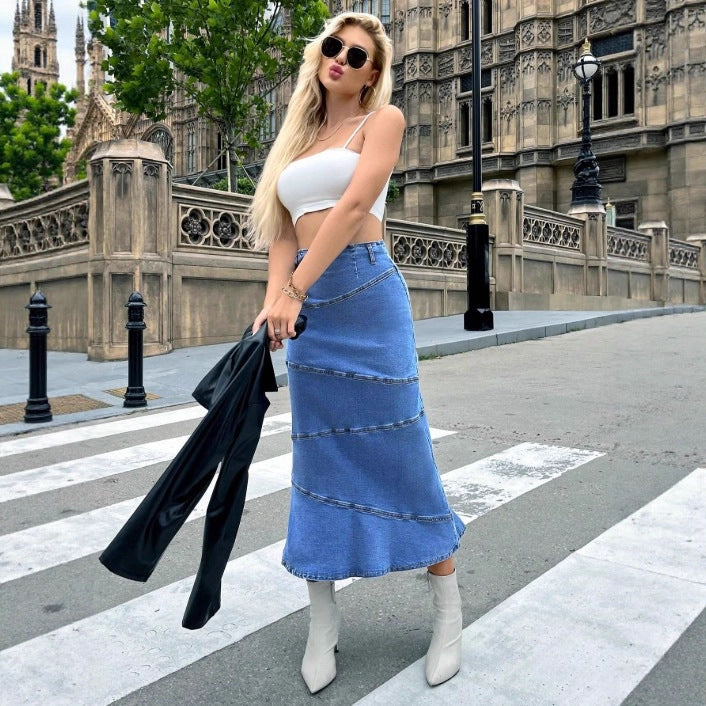 Women's waist-accentuating denim midi skirt with wave-shaped decorative seams and flared hem Fashion Glam