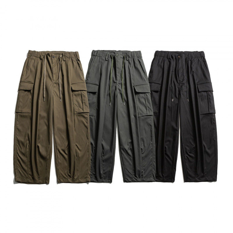 Men's cargo pants in baggy cut with drawstring and large flap pockets Fashion Glam