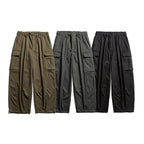 Men's cargo pants in baggy cut with drawstring and large flap pockets Fashion Glam