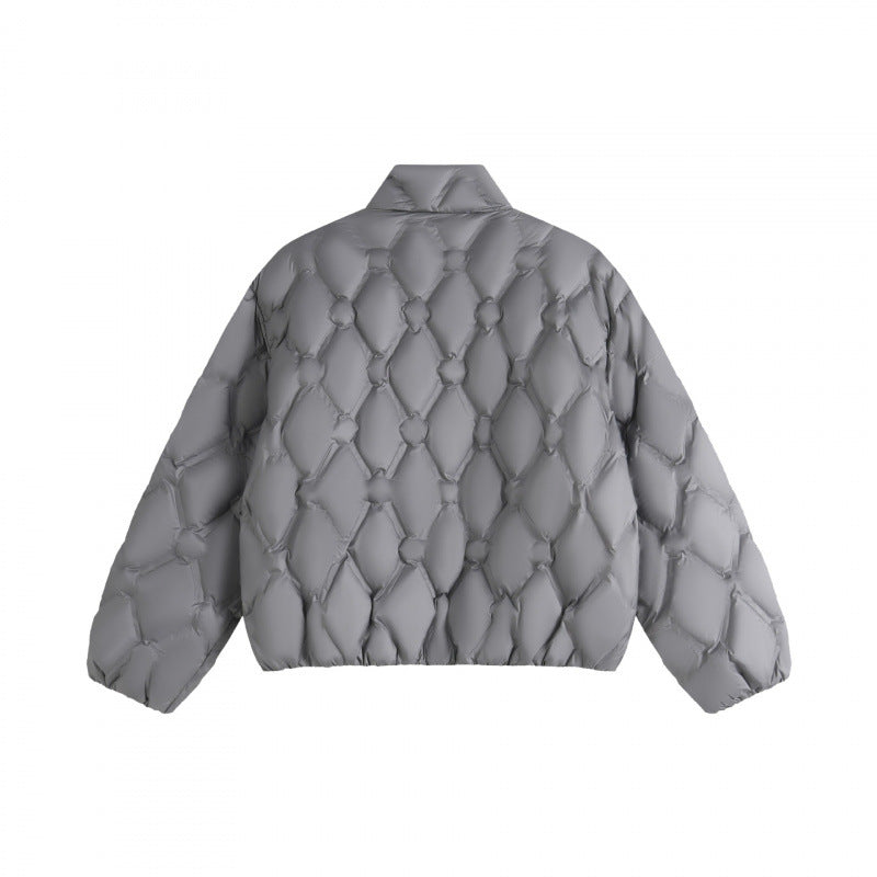 Unisex short cut quilted jacket in boxy cut with diamond quilting and diagonal zip pockets Fashion Glam