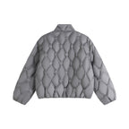 Unisex short cut quilted jacket in boxy cut with diamond quilting and diagonal zip pockets Fashion Glam