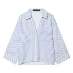Women's Oversized Shirt Blouse with Chest Pockets, Three-Quarter Sleeves, and Curved Back Hem Fashion Glam