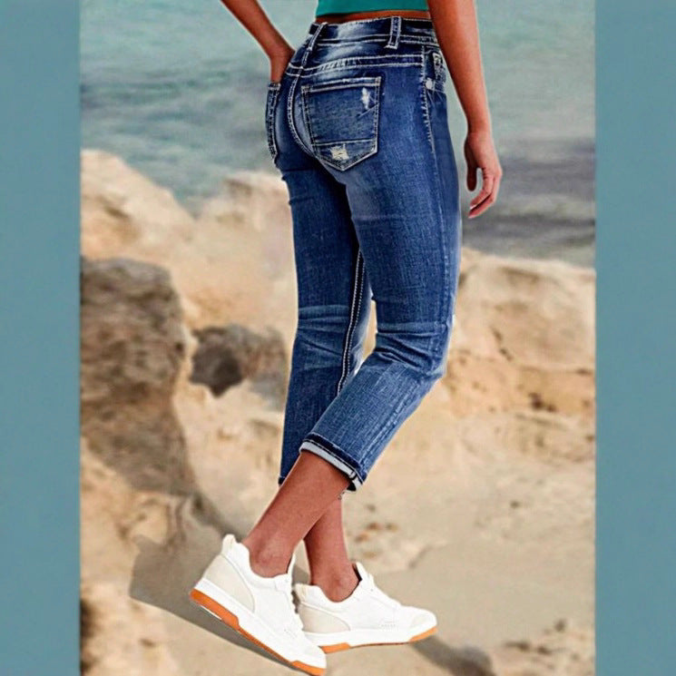 Women's cropped jeans with turn-up, mid-rise waist and used wash Fashion Glam