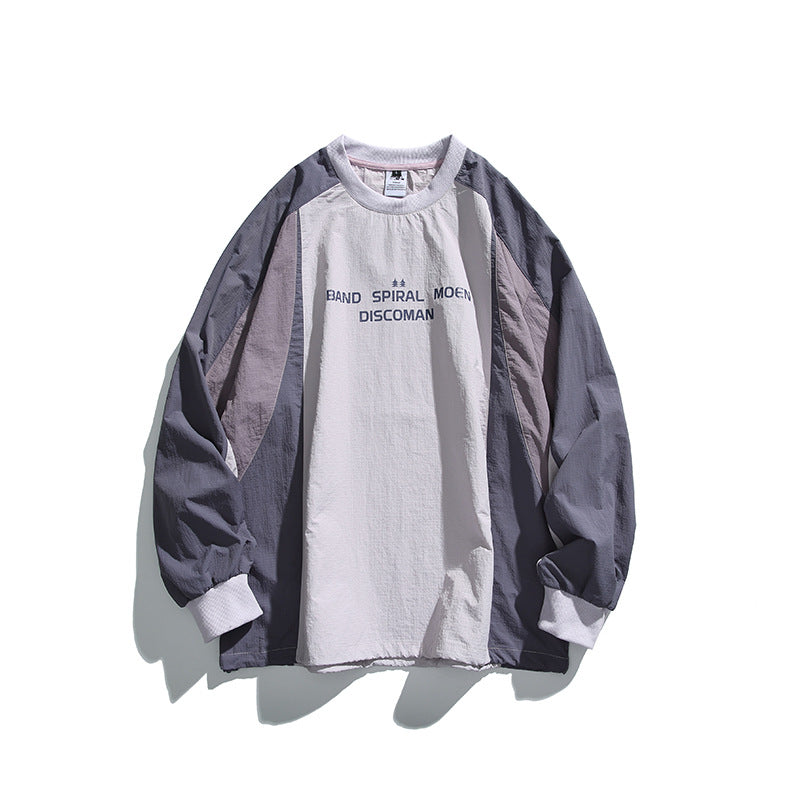 Unisex Loose Fit Colorblock Long Sleeve Shirt made of Lightweight Nylon Blend with Raglan Sleeves and Chest Print Fashion Glam