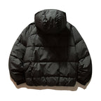 Unisex Oversize quilted jacket in boxy cut with hood and adjustable hem Fashion Glam