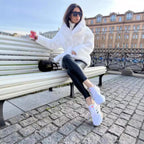 Women’s short coat made of dense faux fur with a tie belt and high stand-up collar Fashion Glam