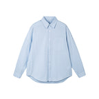 Women's oversized shirt with fine stripes, breast pocket, and rounded hem Fashion Glam
