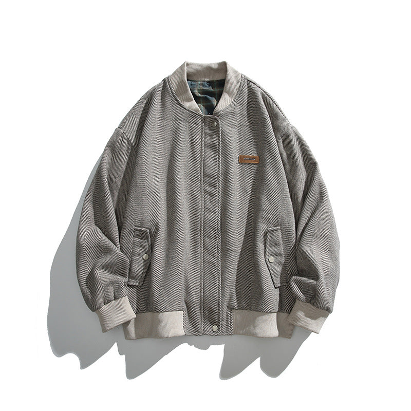 Unisex boxy bomber jacket in herringbone look with ribbed cuffs, flap pockets, and concealed snap button placket Fashion Glam