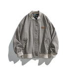 Unisex boxy bomber jacket in herringbone look with ribbed cuffs, flap pockets, and concealed snap button placket Fashion Glam
