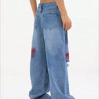 Women's wide Denim jeans with paint splatter and distressed knees Fashion Glam