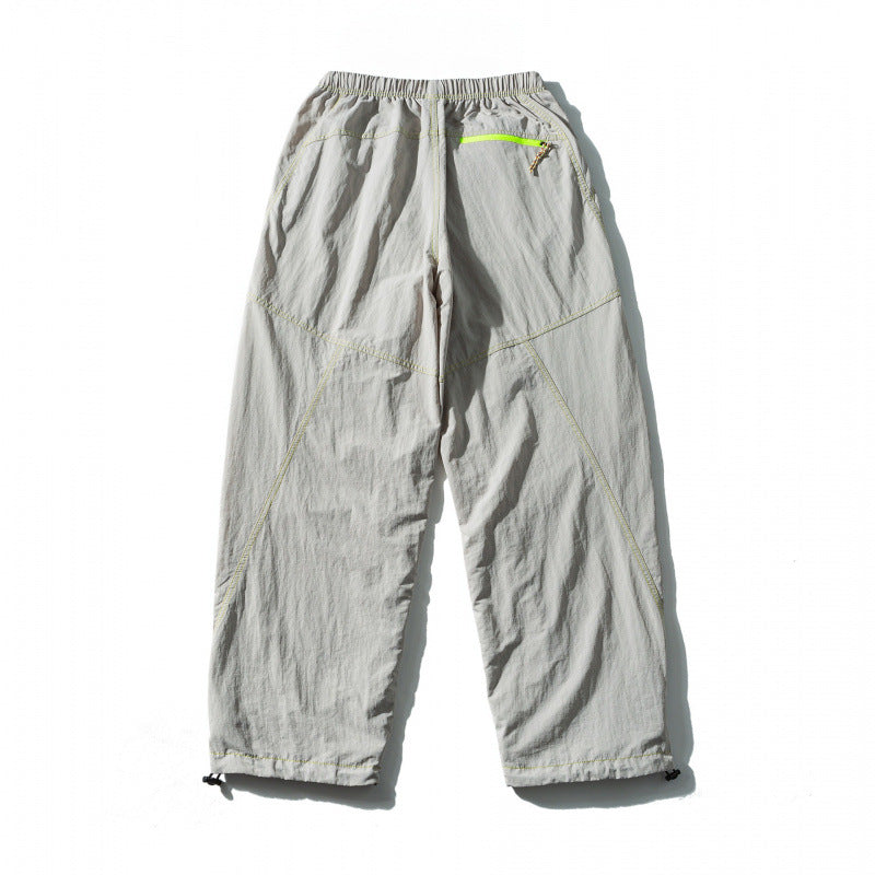 Unisex Loose-fitting outdoor pants with elastic waistband, drawstring, and adjustable leg cuffs Fashion Glam