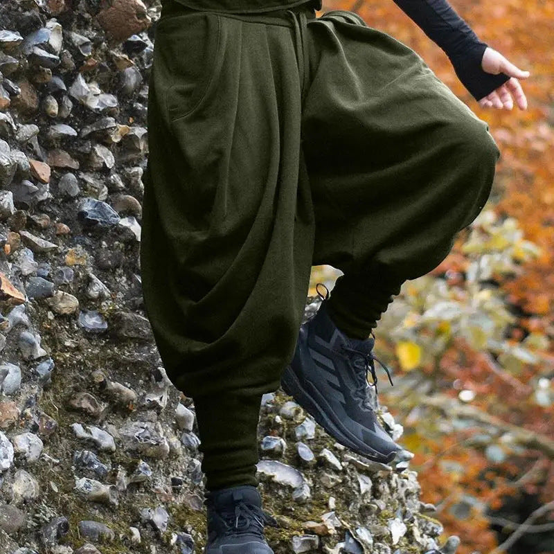 Men's nan avant-garde harem pants with wrap front, elastic waistband, and slim lower leg Fashion Glam