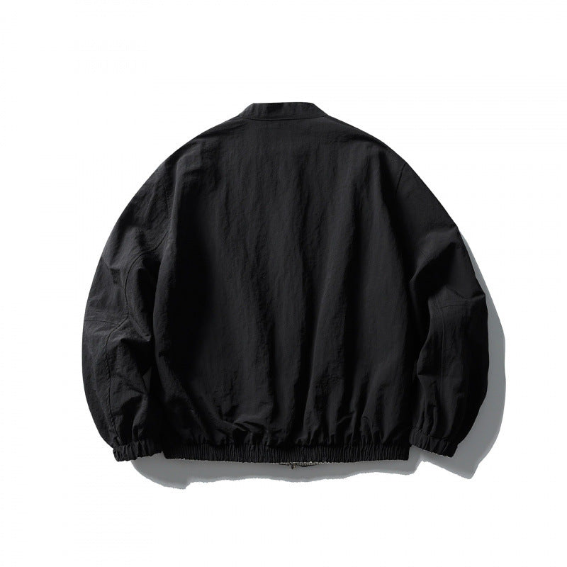 Unisex Light Oversized Bomber Jacket Made of Textured Fabric with Stand-Up Collar and Elastic Hem Fashion Glam