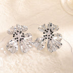 Women’s metal flower earrings with sparkling red accents Fashion Glam