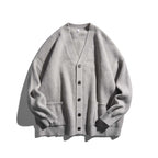 Unisex Oversize fine knit cardigan with V-neck, button placket and patch pockets Fashion Glam