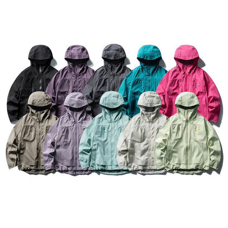 Unisex Technical Softshell Field Jacket with welded seams, four zippered pockets, and extended back part Fashion Glam