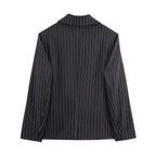 Ladies pinstriped blazer with wide lapels, single-button closure, and flap pockets Fashion Glam