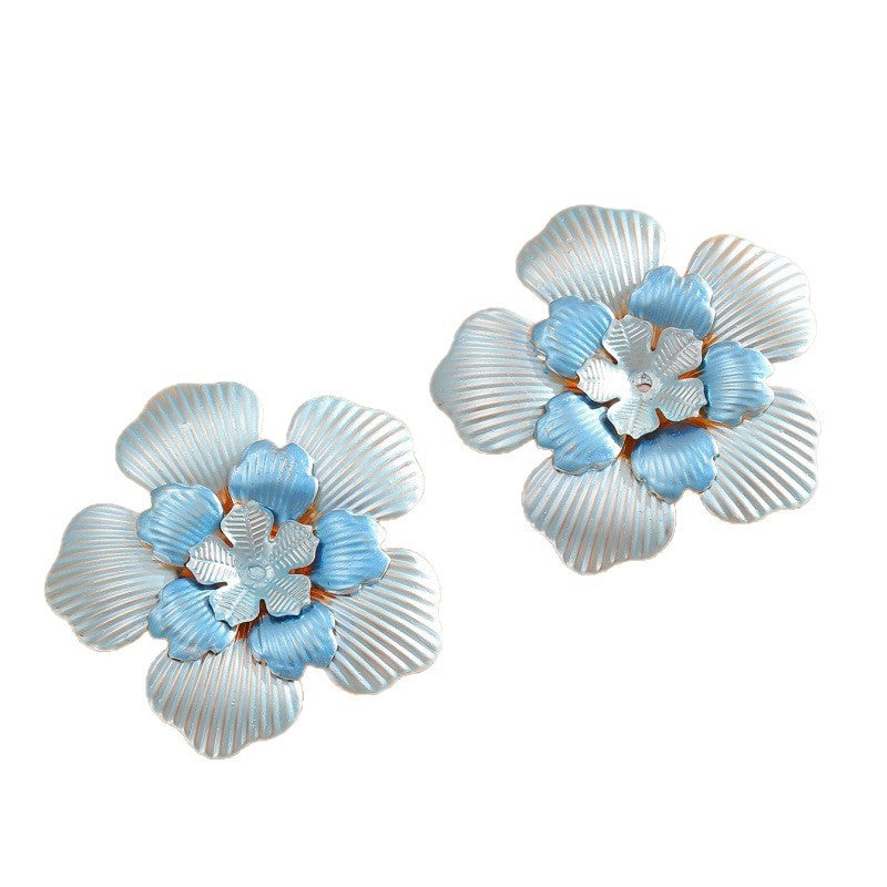 Ladies' flower earrings with intricate design and glossy accents Fashion Glam