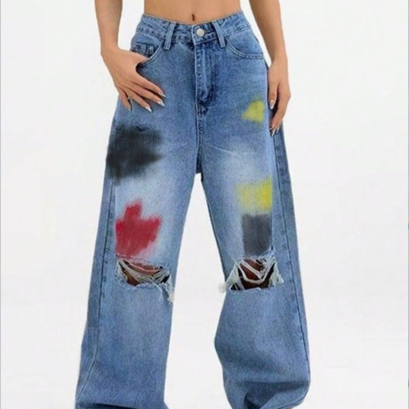 Women's wide Denim jeans with paint splatter and distressed knees Fashion Glam