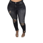 Women high-waisted shapewear skinny jeans with asymmetric rips and ankle-length cut Fashion Glam