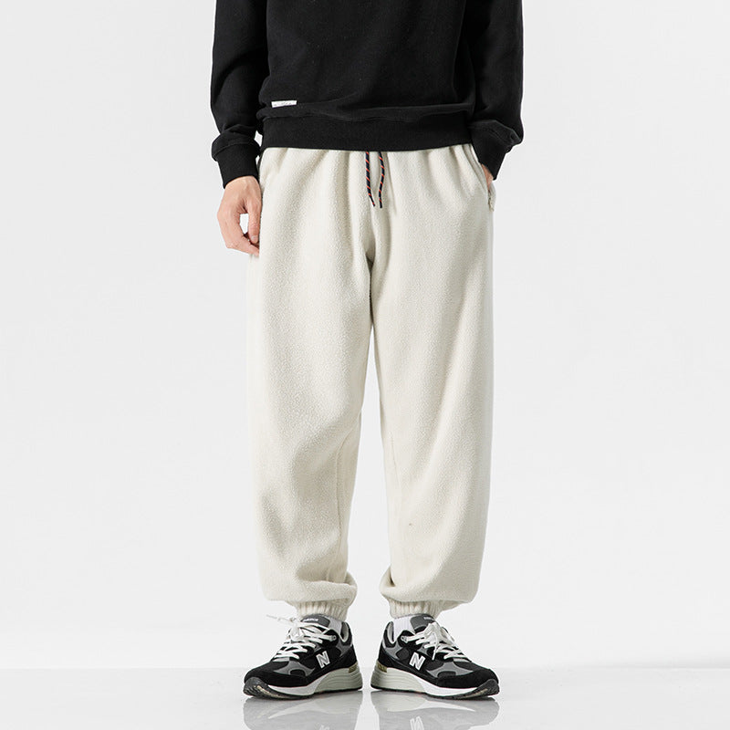 Men's wide-cut fleece jogging pants with elastic cuffs and side pockets Fashion Glam