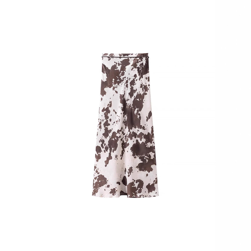 Women's loosely cut shirt blouse with cow spot print and concealed button placket Fashion Glam