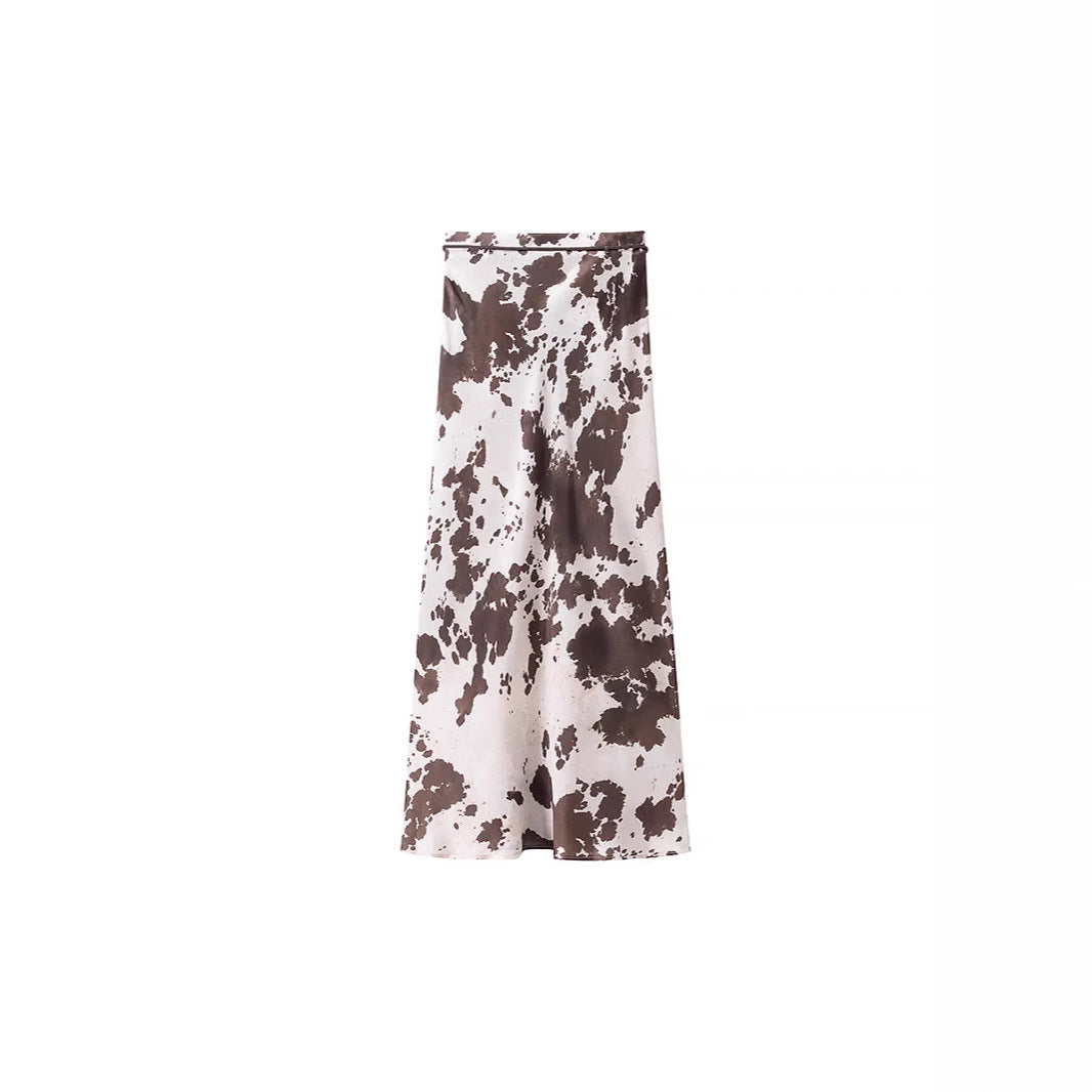Women's loosely cut shirt blouse with cow spot print and concealed button placket Fashion Glam